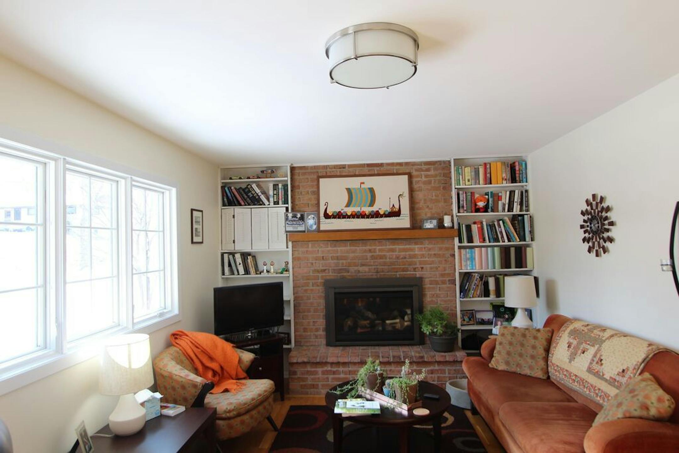 BEFORE: The fireplace was brick.