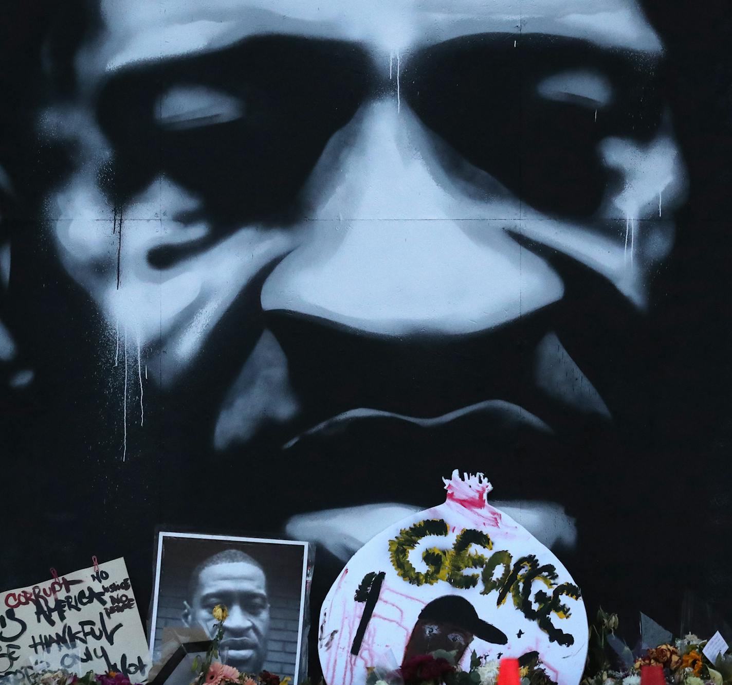 It was fairly quiet at 38th and Chicago Ave., the site of the killing of George Floyd and now a Memorial site, the day after the George Floyd Memorial, as the sun rose gently and birds could be heard amid the sounds of a daily cleanup effort Friday, June 5, 2020 in Minneapolis, MN. The George Floyd mural was created by artist Peyton Scott Russell.] DAVID JOLES • david.joles@startribune.com Ongoing coverage of George Floyd death and aftermath.