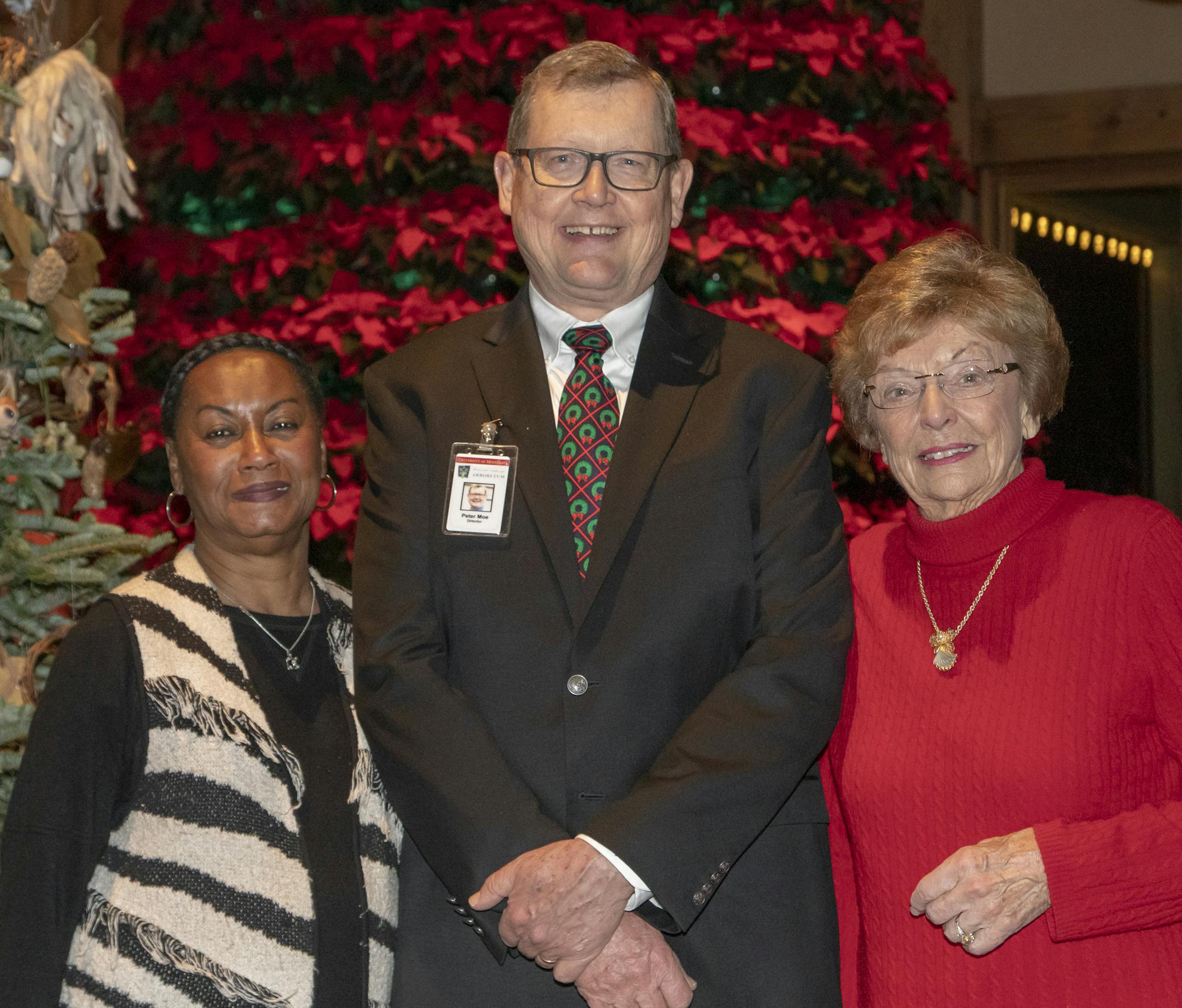 Dr. Delores Henderson, Peter Moe and Nola Wagner at the Winter Lights display at the Minnesota Landscape Arboretum. ] Special to Star Tribune, photo by Matt Blewett, Matte B Photography, matt@mattebphoto.com, Minnesota Landscape Arboretum, Nov. 29, 2018, Chaska, Minnesota, SAXO 1006830611 FACE121618 Nola Wagner (Wagner's Greehouses & Gardens donated the poinsettia tree)
Peter Moe is the Ex Dir. of the Arboretum and he asked Dr. Delores to join the photo.