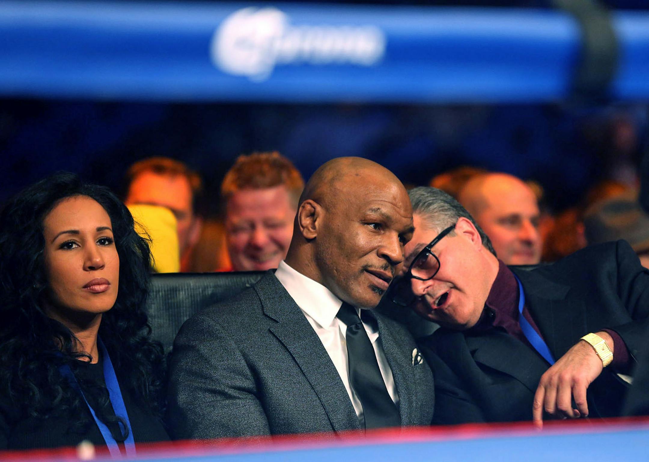 Ex-boxer Mike Tyson talked about the bout of Ossie Duran aka - The Ghanaian Gladiator and USBA Middleweight Champion Caleb Truax, of Osseo, Minnesota with his co-promoter Louie DeCubas during the semi final fight at Target Center in Minneapolis Friday, January 3, 2014. The bout ended in a tie 95-95. ] (KYNDELL HARKNESS/STAR TRIBUNE) kyndell.harkness@startribune.com