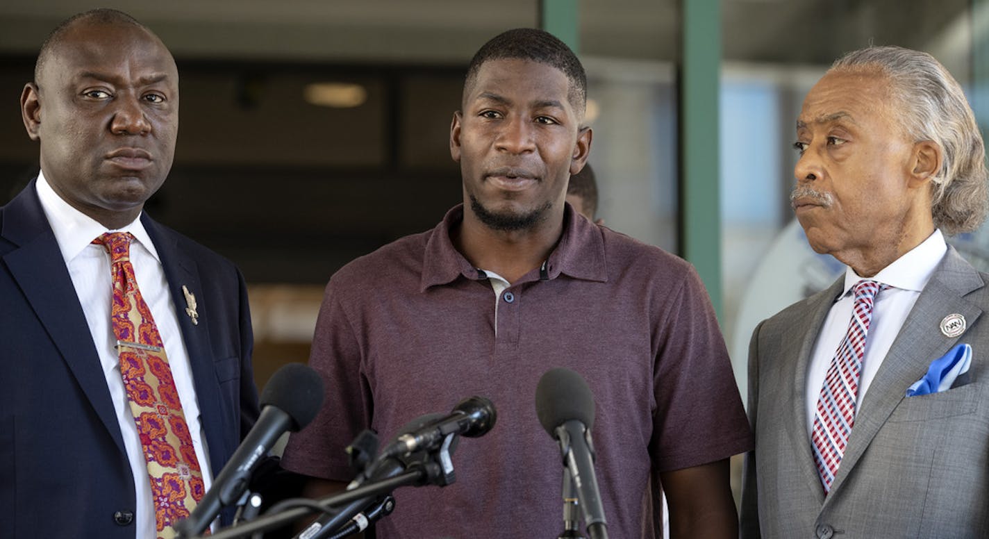 Attorney Benjamin Crump, Quincy Mason (son of George Floyd), and Rev. Al Sharpton spoke during a press conference in Minneapolis on Wednesday. ] CARLOS GONZALEZ • cgonzalez@startribune.com – Minneapolis, MN – June 3, 2020, Police Protest - ATTORNEY BEN CRUMP, REV. AL SHARPTON, GEORGE FLOYD'S SON & ERIC GARNER'S SON TO HOLD PRESS CONF AT 3PM IN MINNEAPOLIS RE DEVELOPMENT - George Floyd