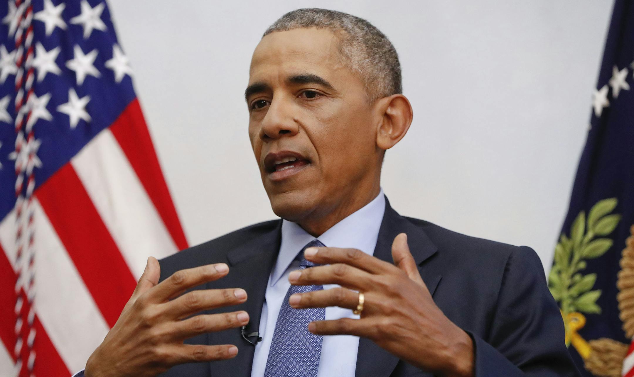 President Barack Obama, right, answers questions during his interview with Vox's Ezra Klein and Sarah Kliff, at the Blair House, across the street from the White House in Washington, Friday, Jan. 6, 2017 in Washington. (AP Photo/Pablo Martinez Monsivais) ORG XMIT: MIN2017010613002917