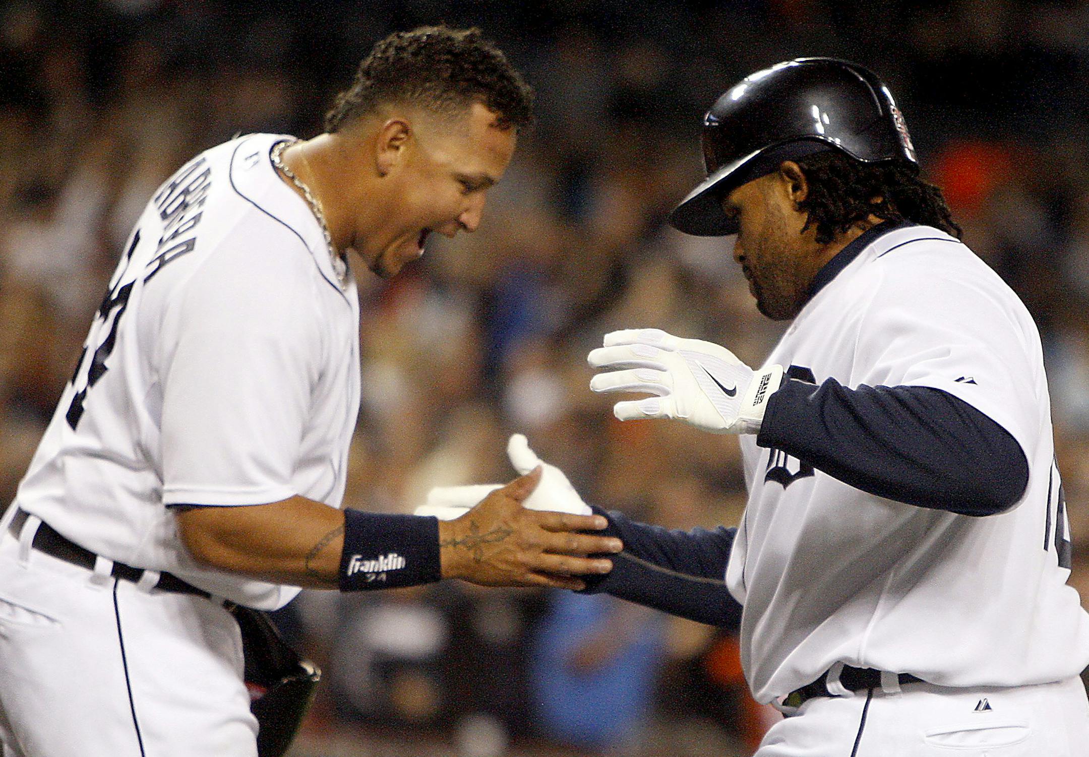 Detroit Tigers' Miguel Cabrera and Prince Fielder celebrate his three-run homer against the Minnesota Twins' Mike Pelfrey during sixth-inning action at Comerica Park in Detroit, Michigan, Monday, April 29, 2013. (Kirthmon F. Dozier/Detroit Free Press/MCT)