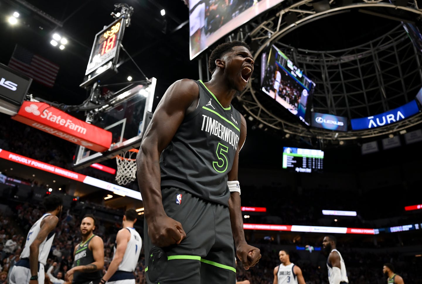 Minnesota Timberwolves guard Anthony Edwards (5) celebrates after scoring a basket with an and-one opportunity in the second quarter against the Dallas Mavericks Thursday, Dec. 28, 2023 at Target Center in Minneapolis, Minn.. ] AARON LAVINSKY • aaron.lavinsky@startribune.com