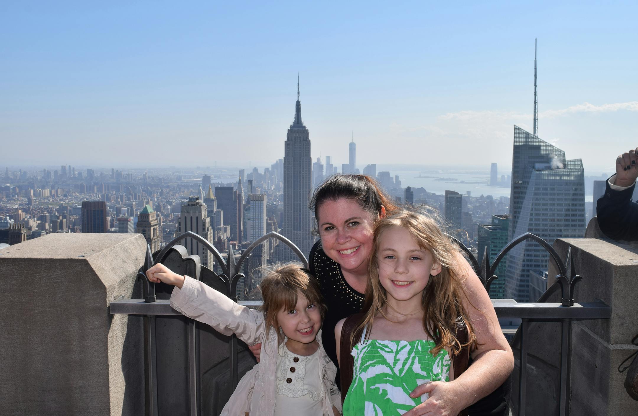 Jenna, 5, Michele and Nalalie, 9, Berg stood on top of Rockefeller Center. (Photo courtesy of Michele Berg)
