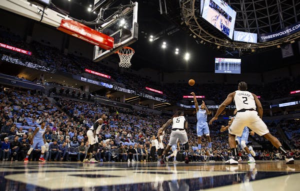 Minnesota Timberwolves guard Jeff Teague (0) pulled up for a floater in the first quarter of Friday's game.