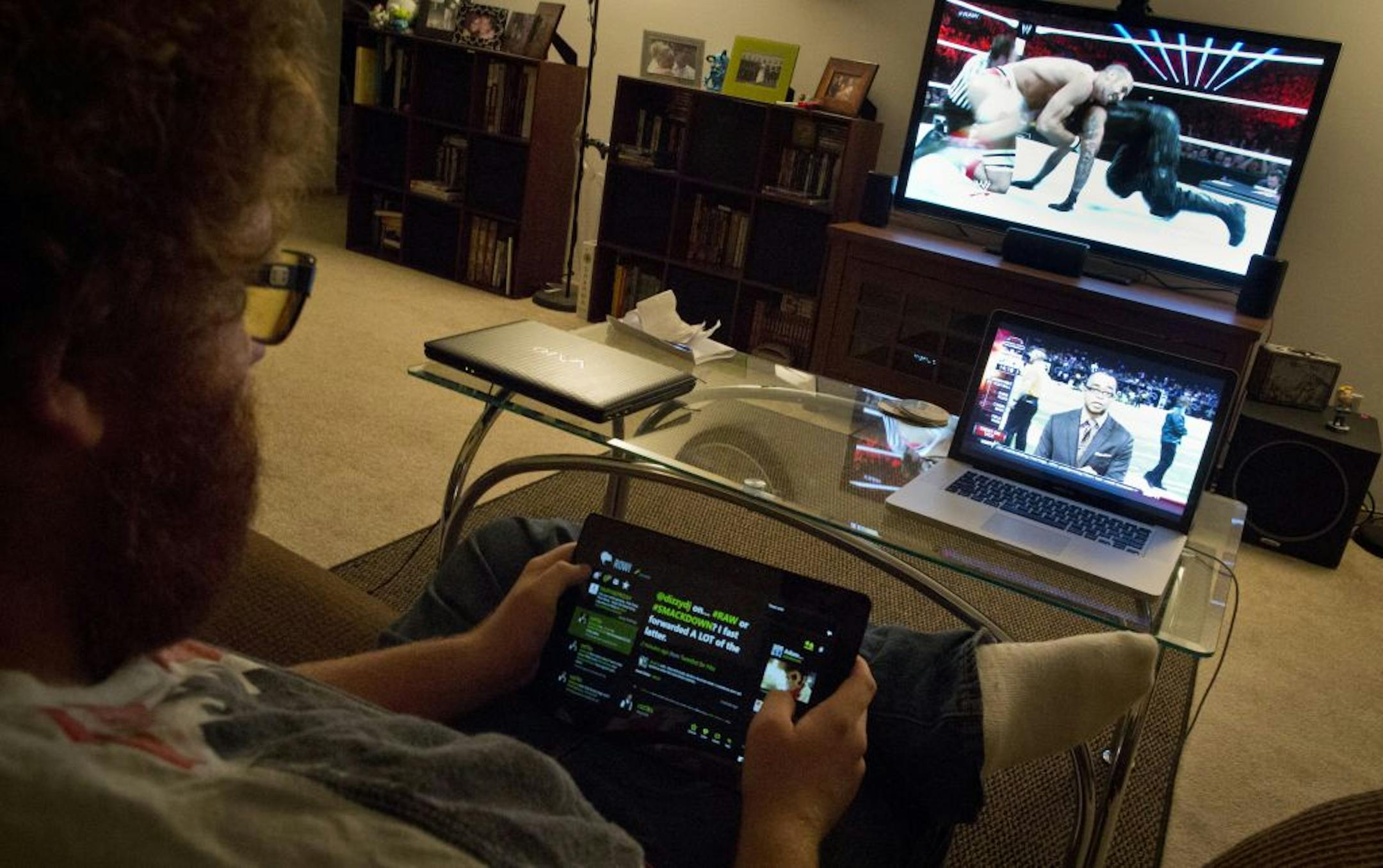 Jacob Geiser watched pro wrestling and Monday Night Football while tweeting at home in Eden Prairie last month.