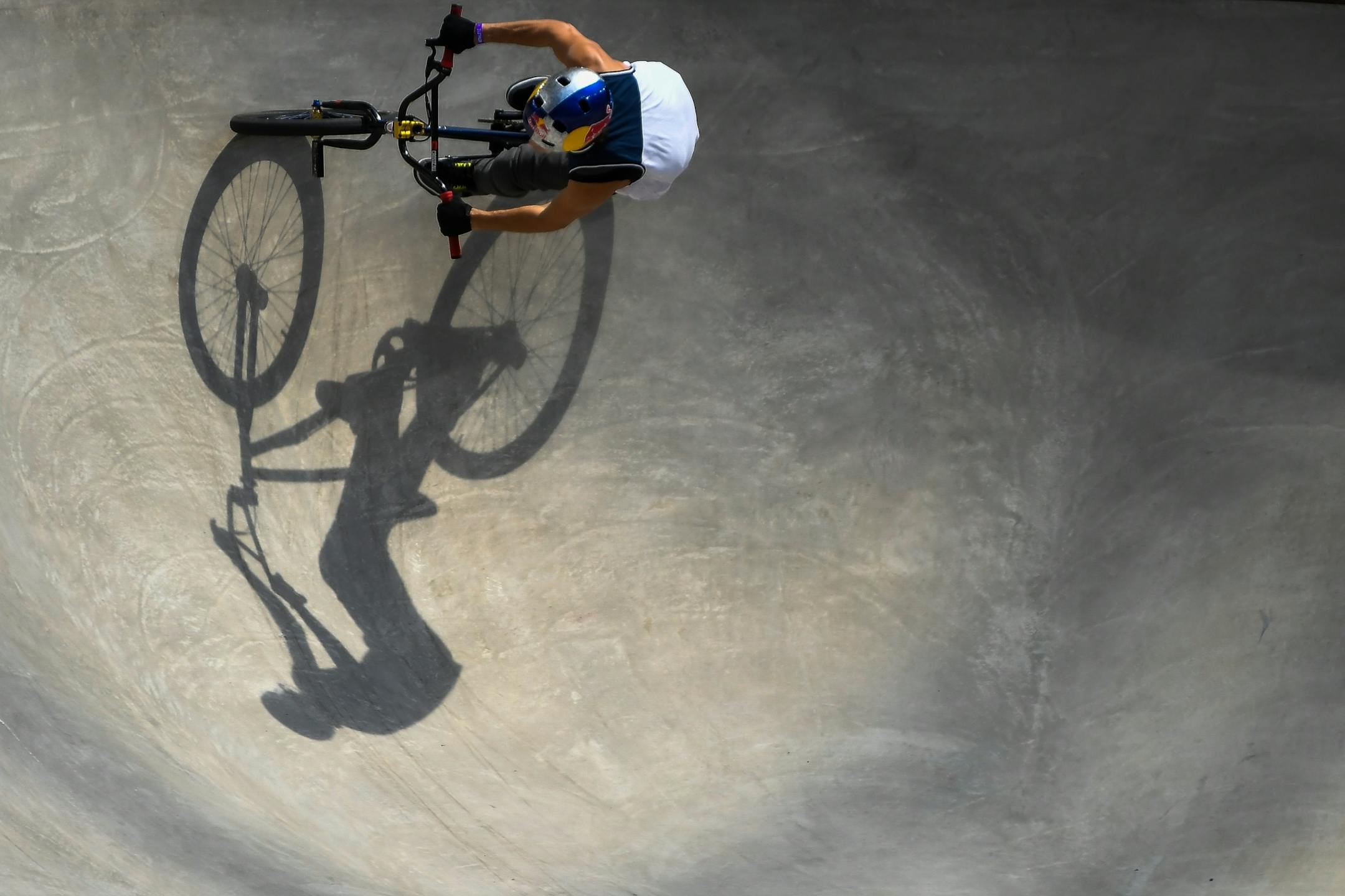 Danile Dhers cast a shadow in the corner of the bowl as he competed in the X Games BMX park finals Saturday.