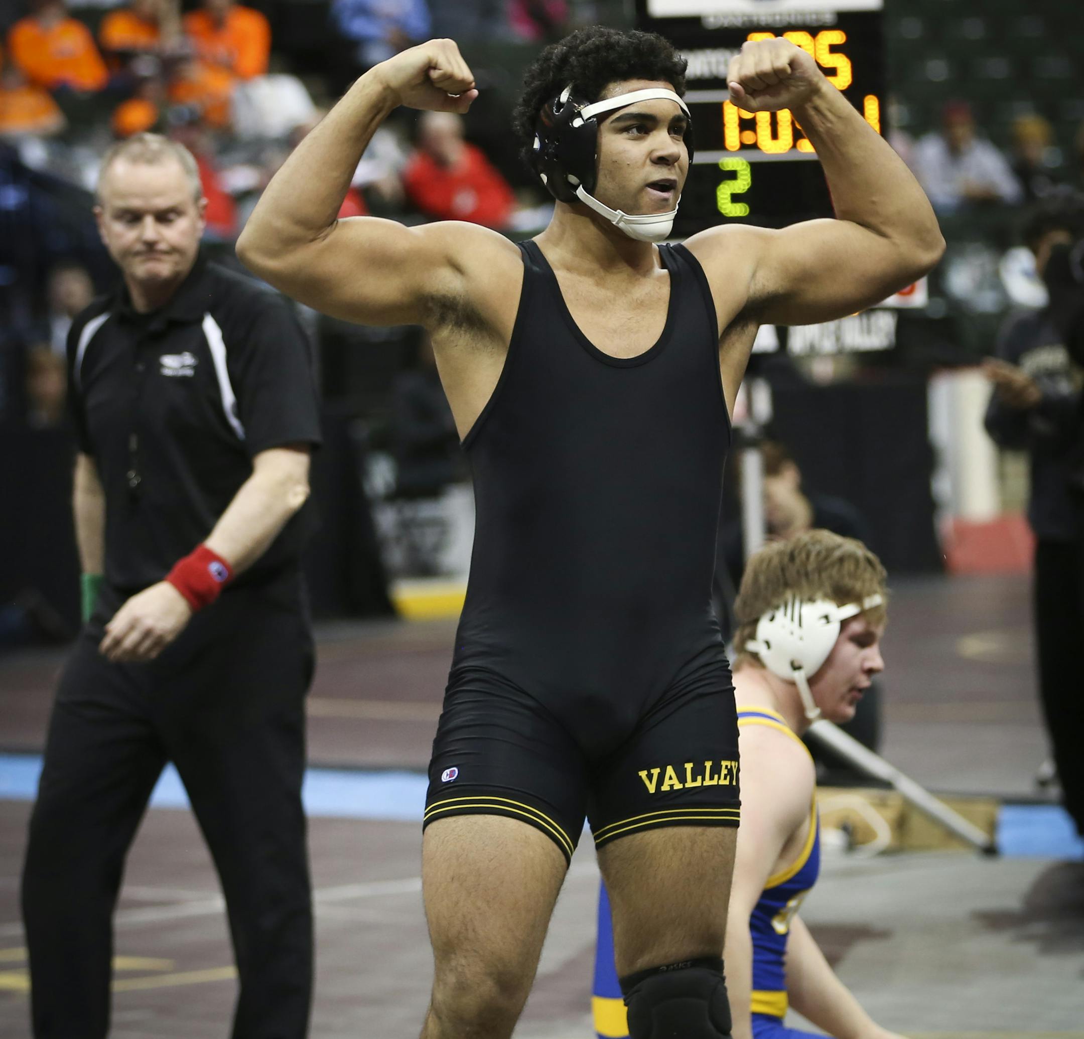 Apple Valley' Gable Steveson celebrated his winning pin over St. Michael-Albertville's Randy Anderson that clenched the Apple Valley win during the final class AAA championship match at the Xcel Energy Center on Thursday, February 26, 2015 in St. Paul, Minn. ] RENEE JONES SCHNEIDER • reneejones@startribune.com