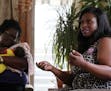 Minneapolis mayoral candidate Nekima Levy-Pounds talked with neighbors during a meet and greet at a supporter's house. ] ANTHONY SOUFFLE &#xef; anthon