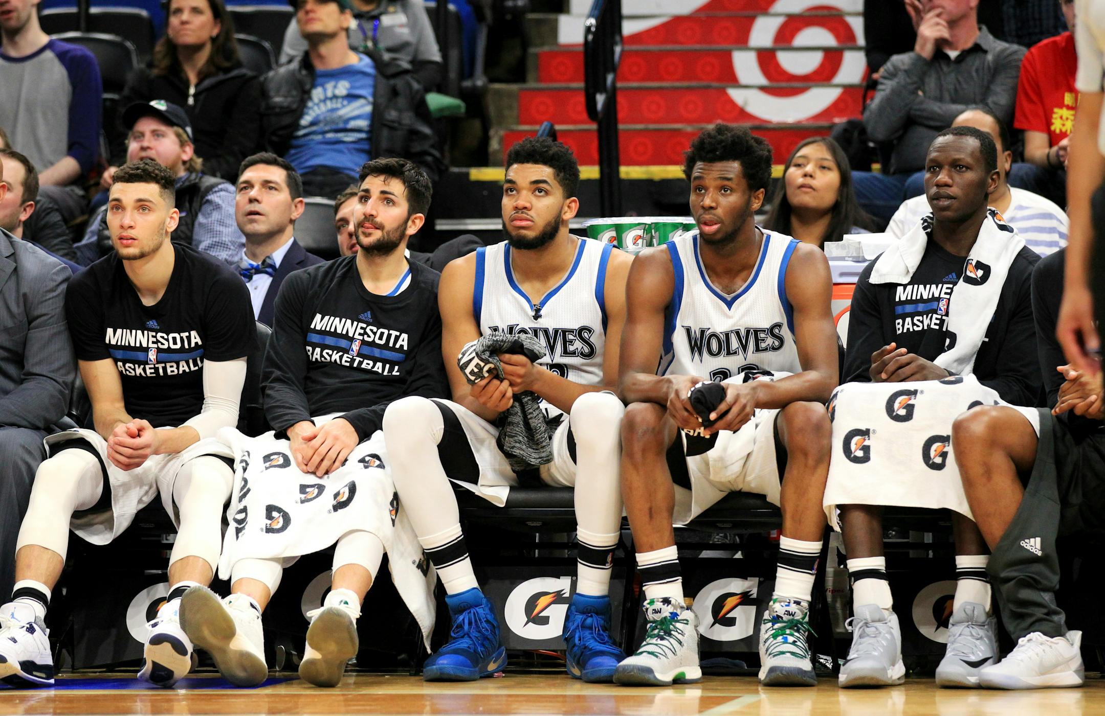 Minnesota Timberwolves starting players, from left, Zach LaVine, Ricky Rubio, Karl-Anthony Towns, Andrew Wiggins and Gorgui Dieng watch from the bench during the fourth quarter against the Brooklyn Nets in an NBA basketball game in Minneapolis, Saturday, Jan. 28, 2017. The Timberwolves defeated the Nets 129-109. (AP Photo/Andy Clayton-King)