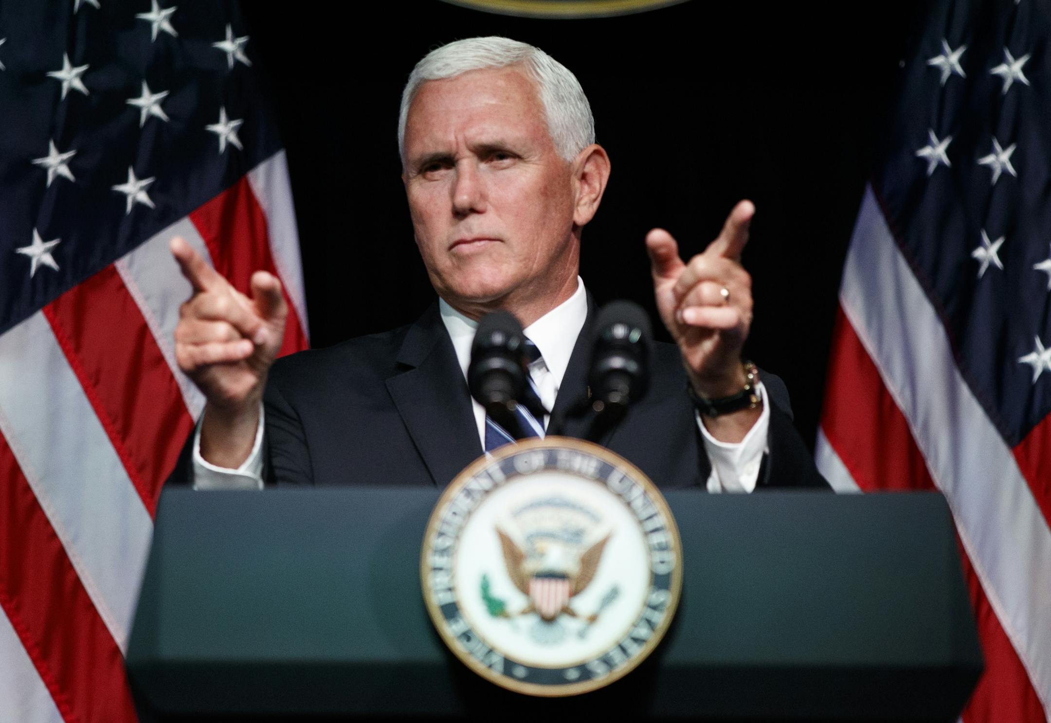 FILE - In this Aug. 9, 2018, file photo, Vice President Mike Pence gestures during an event on the creation of a U.S. Space Force at the Pentagon. Rising space power China is attacking the newly created U.S. Space Force as a &#x201c;direct threat to outer space peace and security." Its foreign ministry says China is &#x201c;deeply concerned about it and resolutely opposed to it." (AP Photo/Evan Vucci, File)