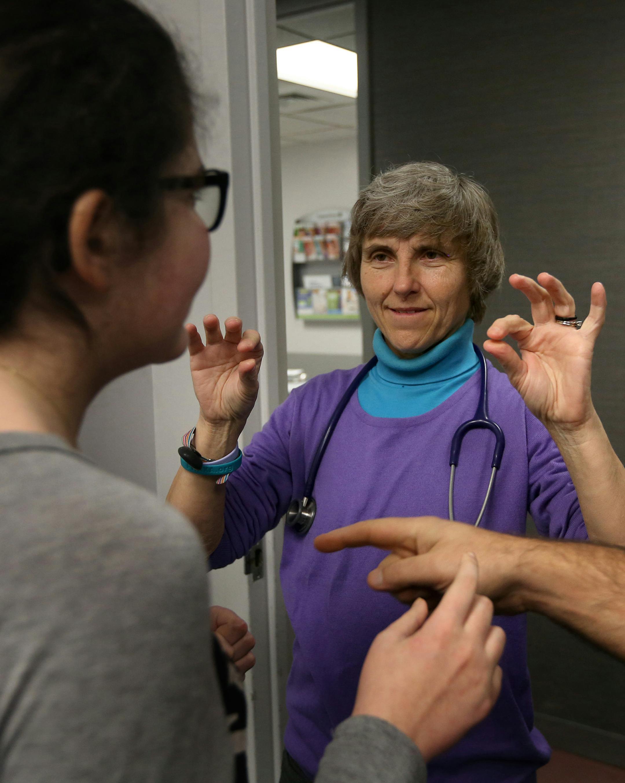 Dr. Elizabeth Berry-Kravis, center, along with Gail Koujaian, perform tests on Hayley, 16, left, who has NP-C, on Feb. 3, 2016 at Rush University Medical Center in Chicago. (Nancy Stone/Chicago Tribune/TNS)