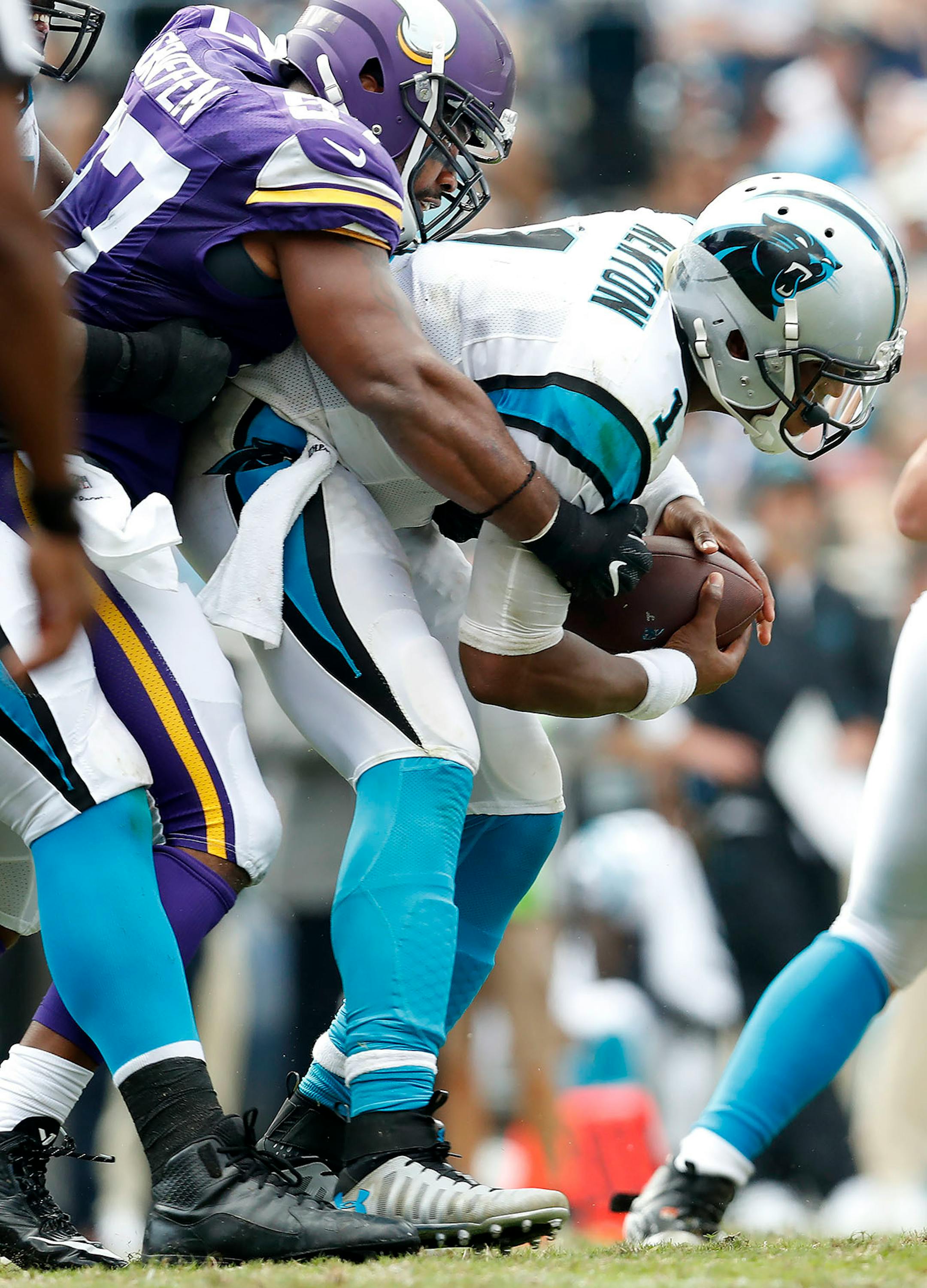 Everson Griffen (97) sacked Cam Newton (1) in the fourth quarter.