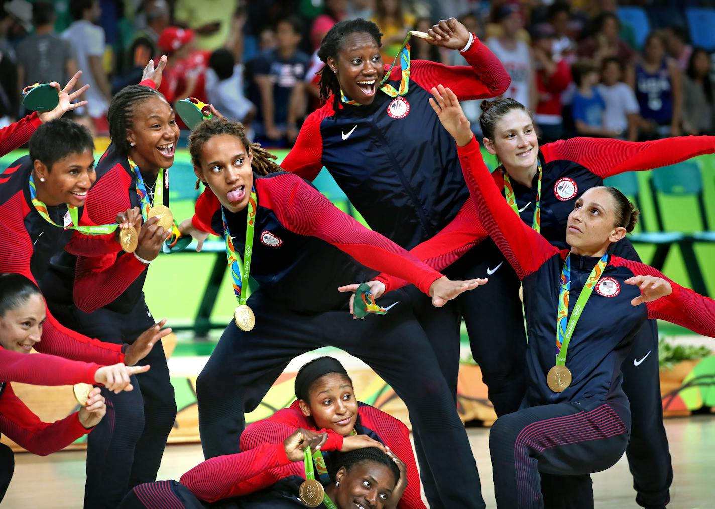 The USA's women's basketball team posed with their gold medals after the medal ceremony. The Lynx's Lindsay Whalen (top right) scored 17 points off the bench in the victory, giving the U.S. women's basketball team its sixth consecutive gold medal.