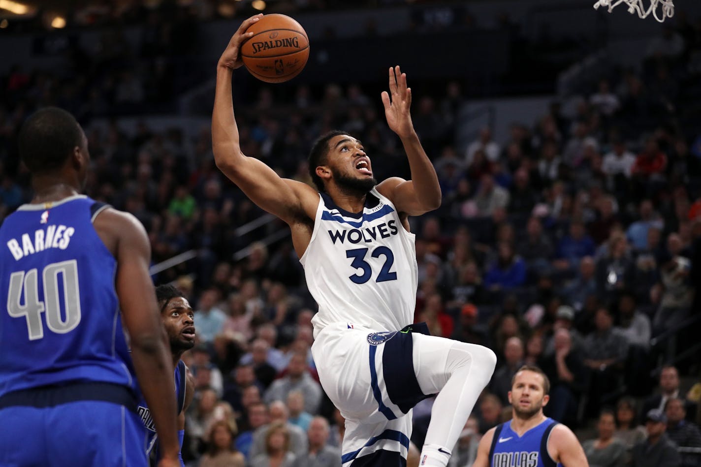 Karl-Anthony Towns (32) dunked the ball in the first half.against Dallas earlier this season.