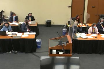 In this screen grab from video, former Brooklyn Center police Officer Kim Potter sat at the defense table, right, as the prosecution, left, and the de