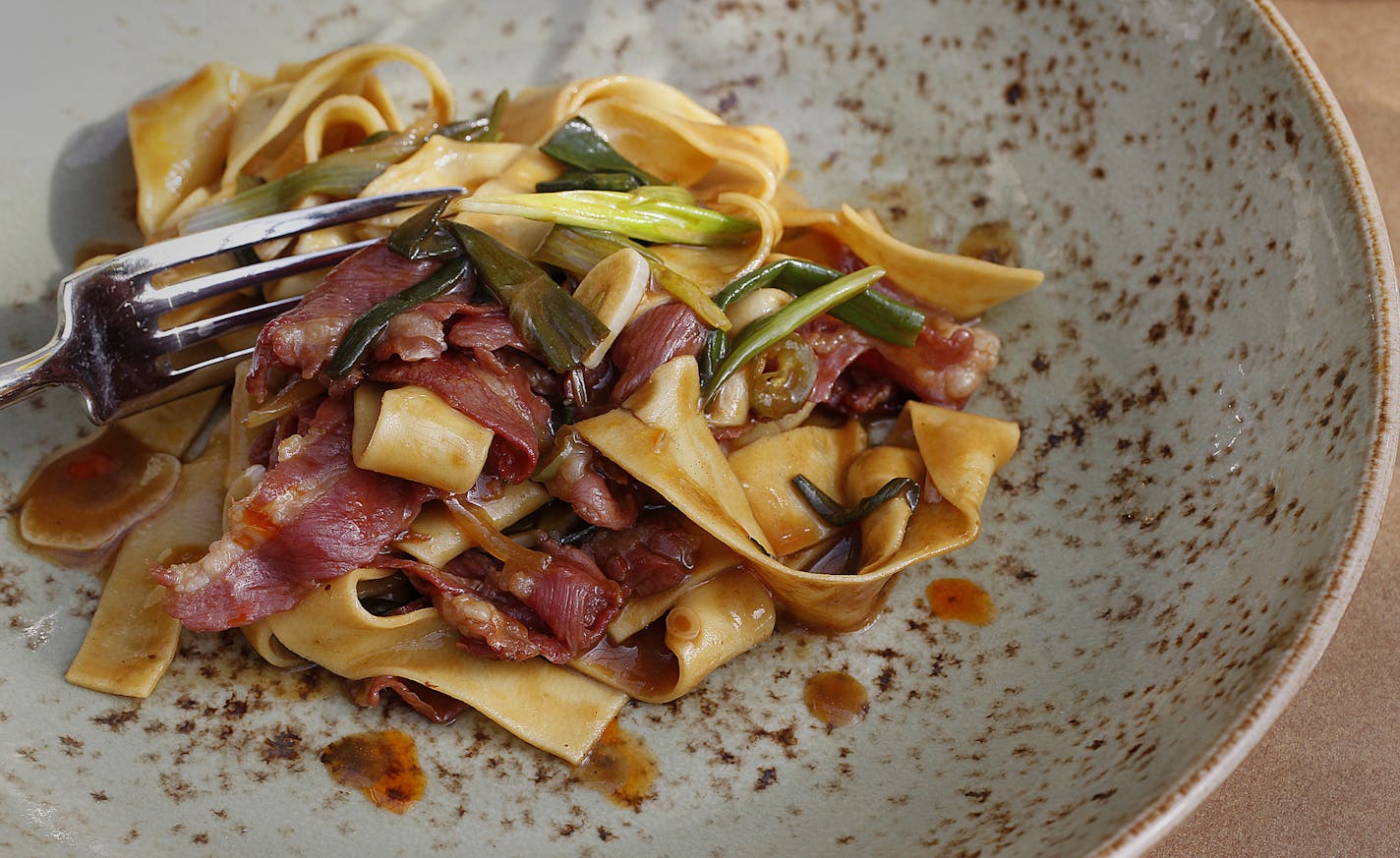 The food: egg noodle pasta with sauteeded lamb belly. Shinders redone. The Rick Nelson Review of the Union Bar, downtown Minneapolis. The chef, Jim Christiansen ] TOM WALLACE &#x2022; twallace@startribune.com _ Assignments #20027981A_ March 7, 2013_ SLUG: 253874 rn031413_ EXTRA INFORMATION: Union in downtown Minneapolis. 731 Hennepin Av 612 455 6690 chef Jim Christiansen