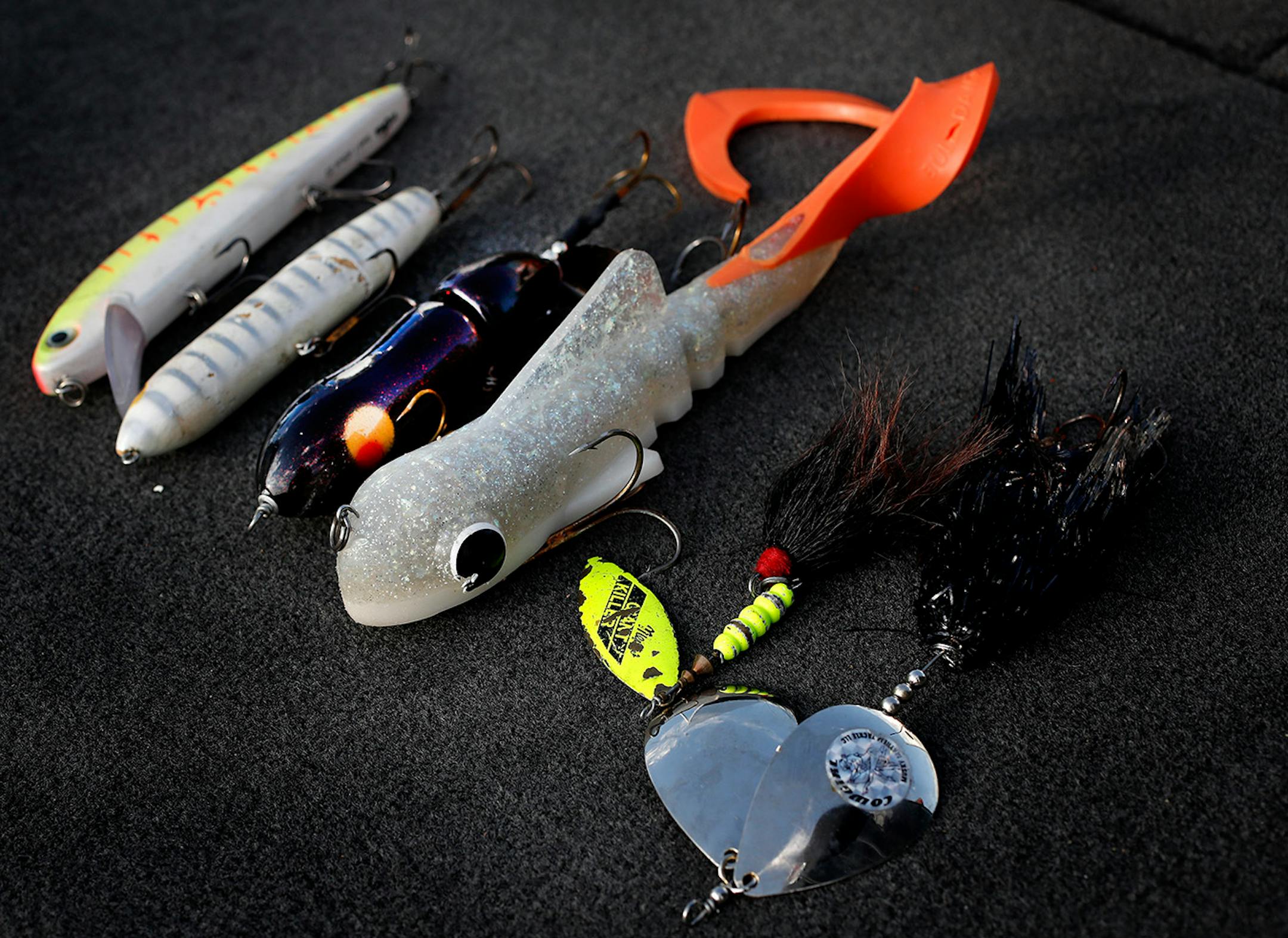 Fishing guide Travis Frank uses a variety of lures to fish for Muskie.