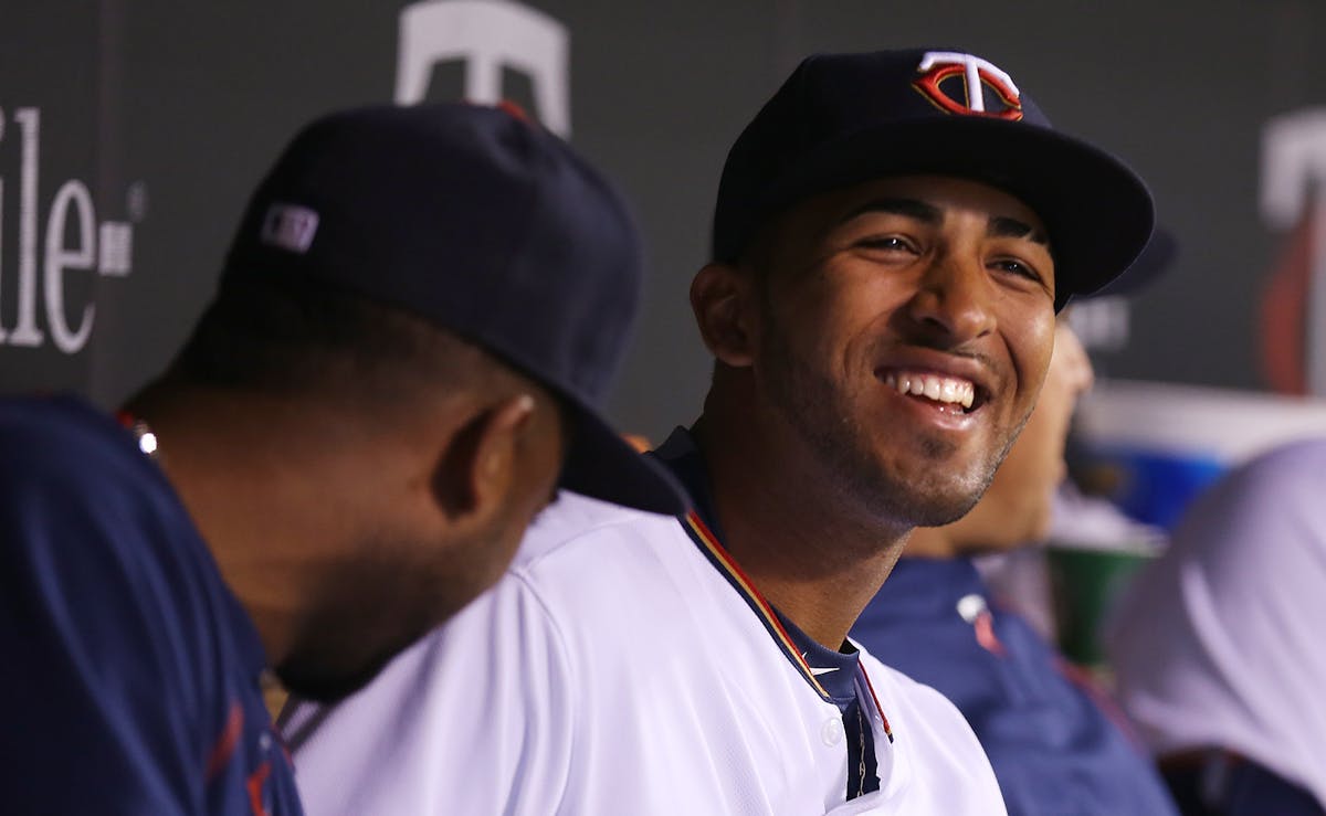 Eddie Rosario sits on the Minnesota Twins bench after being recalled from Triple-A Rochester during a game against the Oakland Athletics at Target Fie