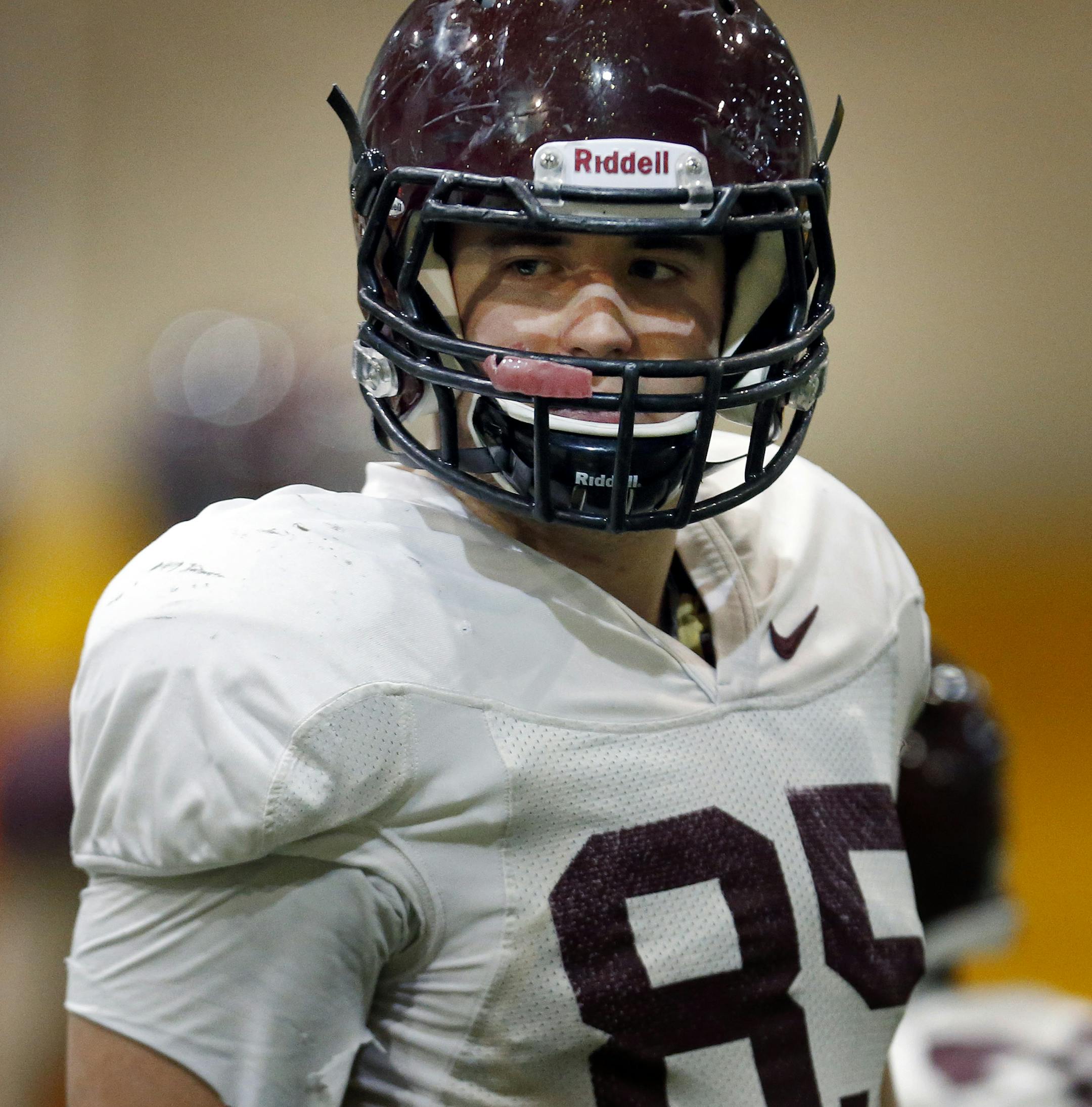 Gophers tight end Lincoln Plsek (85) talked with head coach Jerry Kill at the start of practice on Thursday. ] CARLOS GONZALEZ cgonzalez@startribune.com April 18, 2013, Minneapolis, Minn., NCAA, University of Minnesota Gophers Spring Football Practice, at Bierman complex, ORG XMIT: MIN1304181901241977