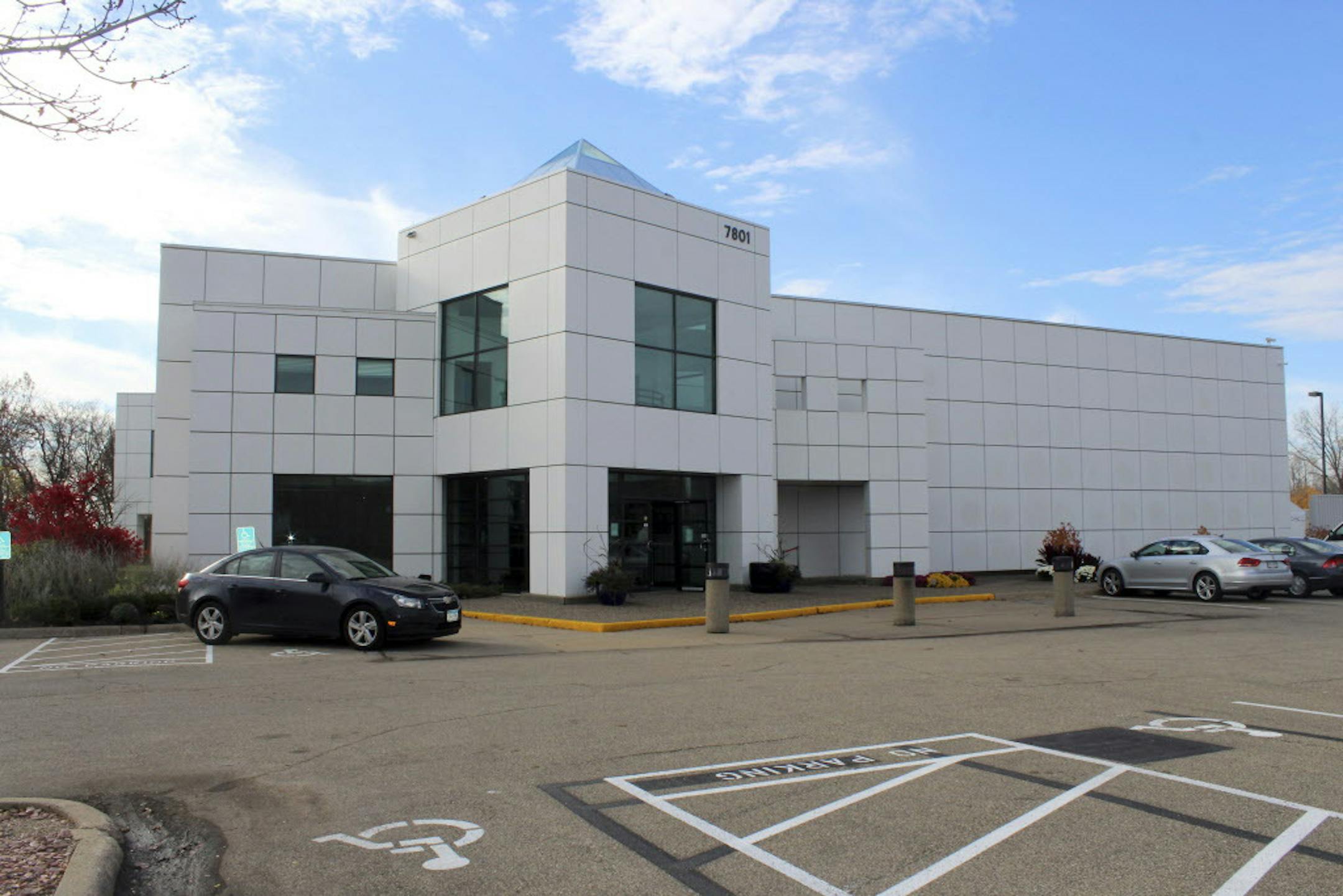 FILE - In this Nov. 2, 2016 file photo, cars are parked outside Prince's Paisley Park in Chanhassen, Minn. Operators of Princeís former home and recording complex in Minnesota are seeking a special permit so they can serve alcohol during the week of the Super Bowl. Some people are questioning the request, noting the late musician didn't allow alcohol to be served at public events at Paisley Park. The complex was turned into a museum following Princeís death last year. (AP Photo/Jeff Ba