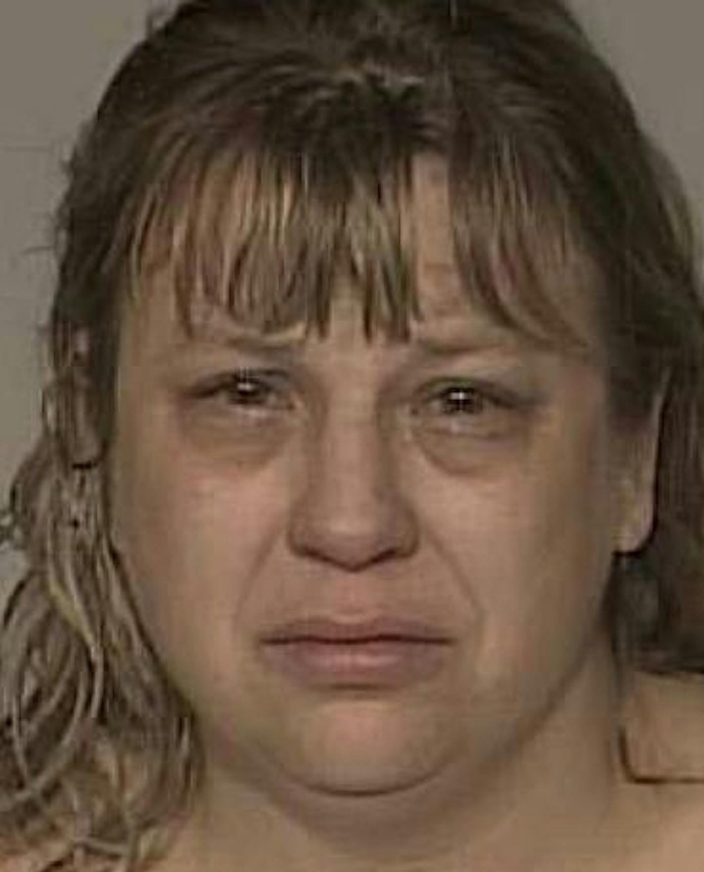 Jodie Burchard-Risch is charged with assaulting another diner in a Coon Rapids restaurant.