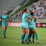 Minnesota Aurora players celebrated during their 5-1 victory over Bavarian United on Saturday night before an announced 6,423 at TCO Stadium.