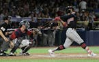 Cleveland's Francisco Lindor hits a home run against the Minnesota Twins during the fifth inning at Hiram Bithorn Stadium in San Juan