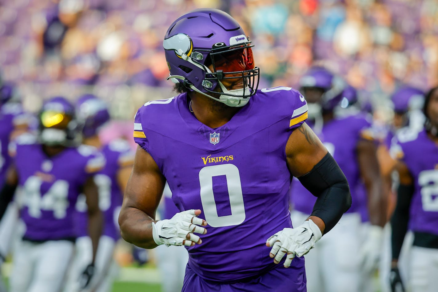 Minnesota Vikings linebacker Marcus Davenport walks off the field before the team's preseason NFL football game against the Tennessee Titans, Saturday, Aug. 19, 2023, in Minneapolis.