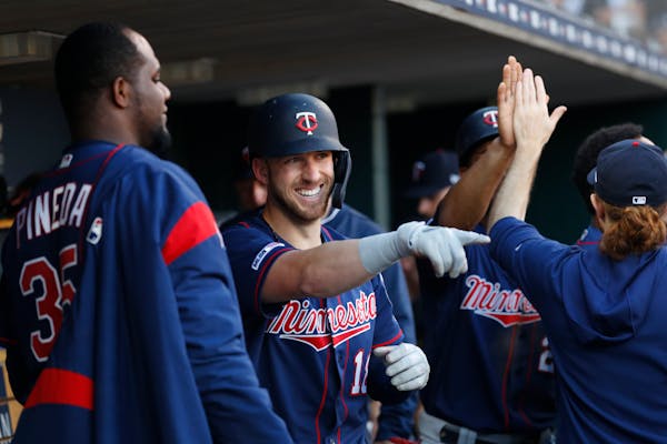 The Twins' Mitch Garver celebrates his two-run home run in the third inning