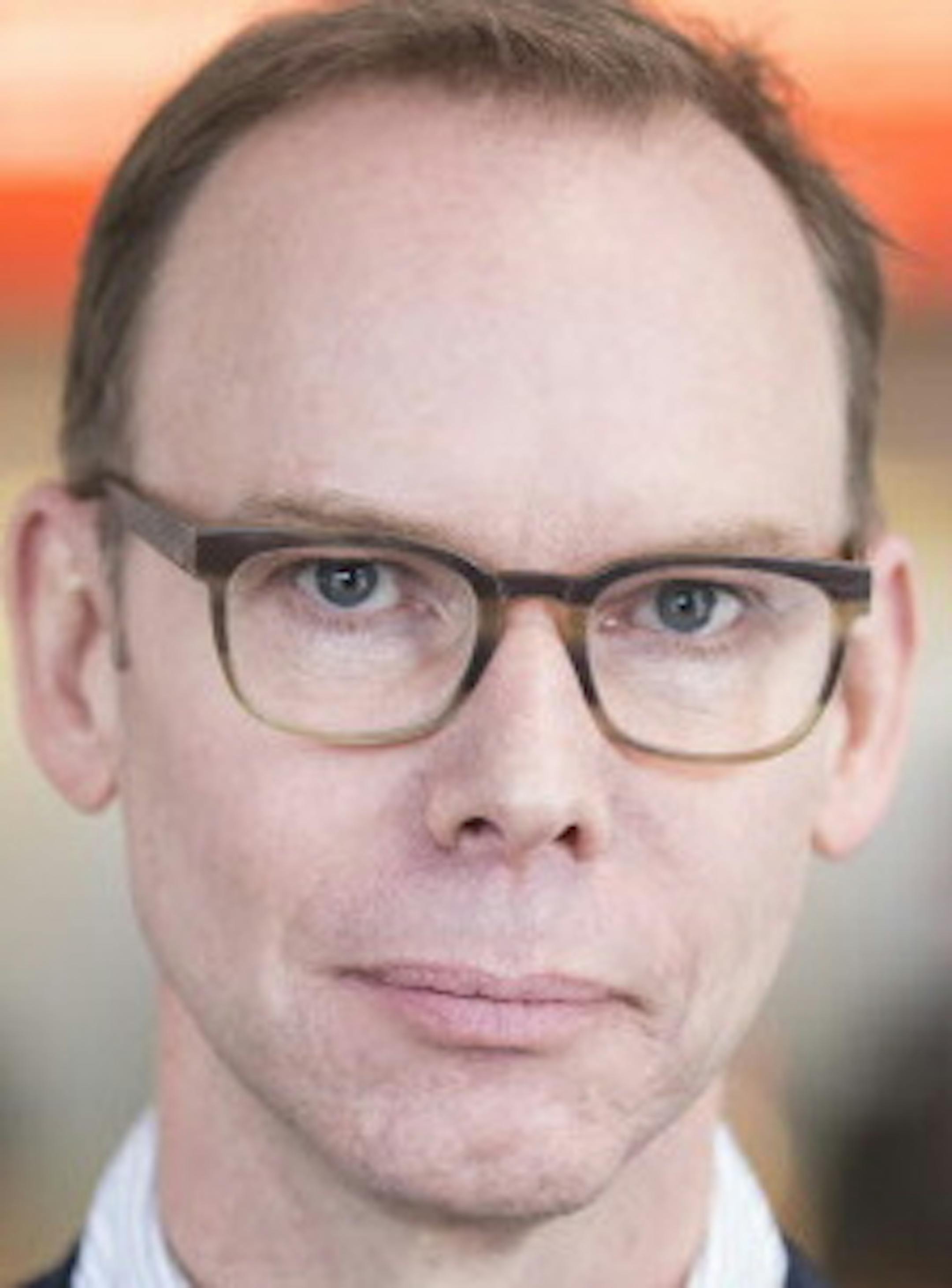 Chipotle Mexican Grill founder and CEO Steve Ells speaks during an interview with the Associated Press in a Chipotle restaurant on Tuesday Dec. 15, 2015, in Seattle. Ells was visiting restaurants in the Pacific Northwest to discuss new food safety protocols with employees after an E. coli outbreak sickened 50 people in the Northwest. (AP Photo/Stephen Brashear)