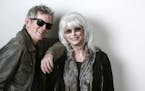 In this April 30, 2015 photo, musicians Rodney Crowell, left, and Emmylou Harris pose for a portrait to promote their album "The Traveling Kind" in Ne