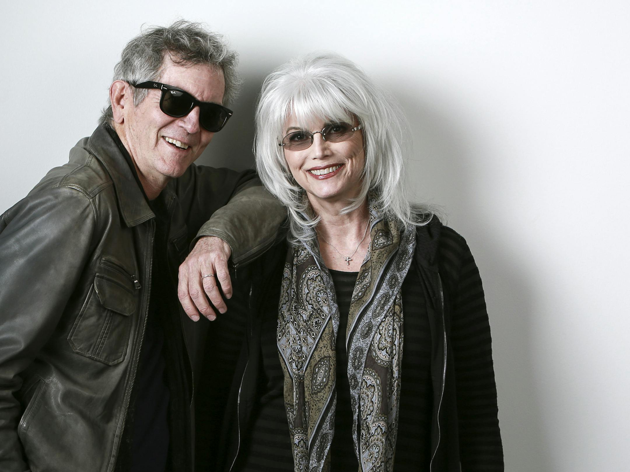 In this April 30, 2015 photo, musicians Rodney Crowell, left, and Emmylou Harris pose for a portrait to promote their album "The Traveling Kind" in New York. (Photo by Amy Sussman/Invision/AP)