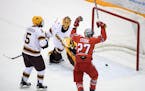 Minnesota Golden Gophers goaltender Mat Robson (40) was unable to stop a goal by Ohio State Buckeyes forward Mason Jobst (26), not pictured, giving Oh