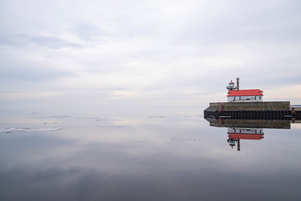 Duluth South Pier Lighthouse was reflected on Lake Superior this year on Feb. 06 at Canal Park in Duluth, Minn.    ]

ALEX KORMANN • alex.kormann@startribune.com