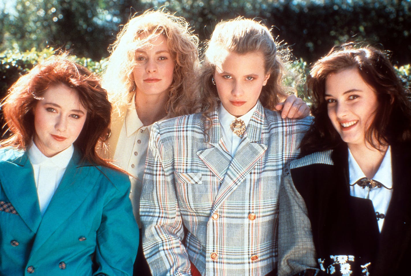 From left, Shannen Doherty, Lisanne Falk, Kim Walker and Winona Ryder on set of the film "Heathers," 1988. (New World Pictures/Getty Images/TNS) ORG XMIT: 1481279