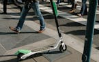 FILE -- A scooter on the sidewalk in downtown San Francisco, April 16, 2018. Doctors and public health workers in San Francisco are preparing to track