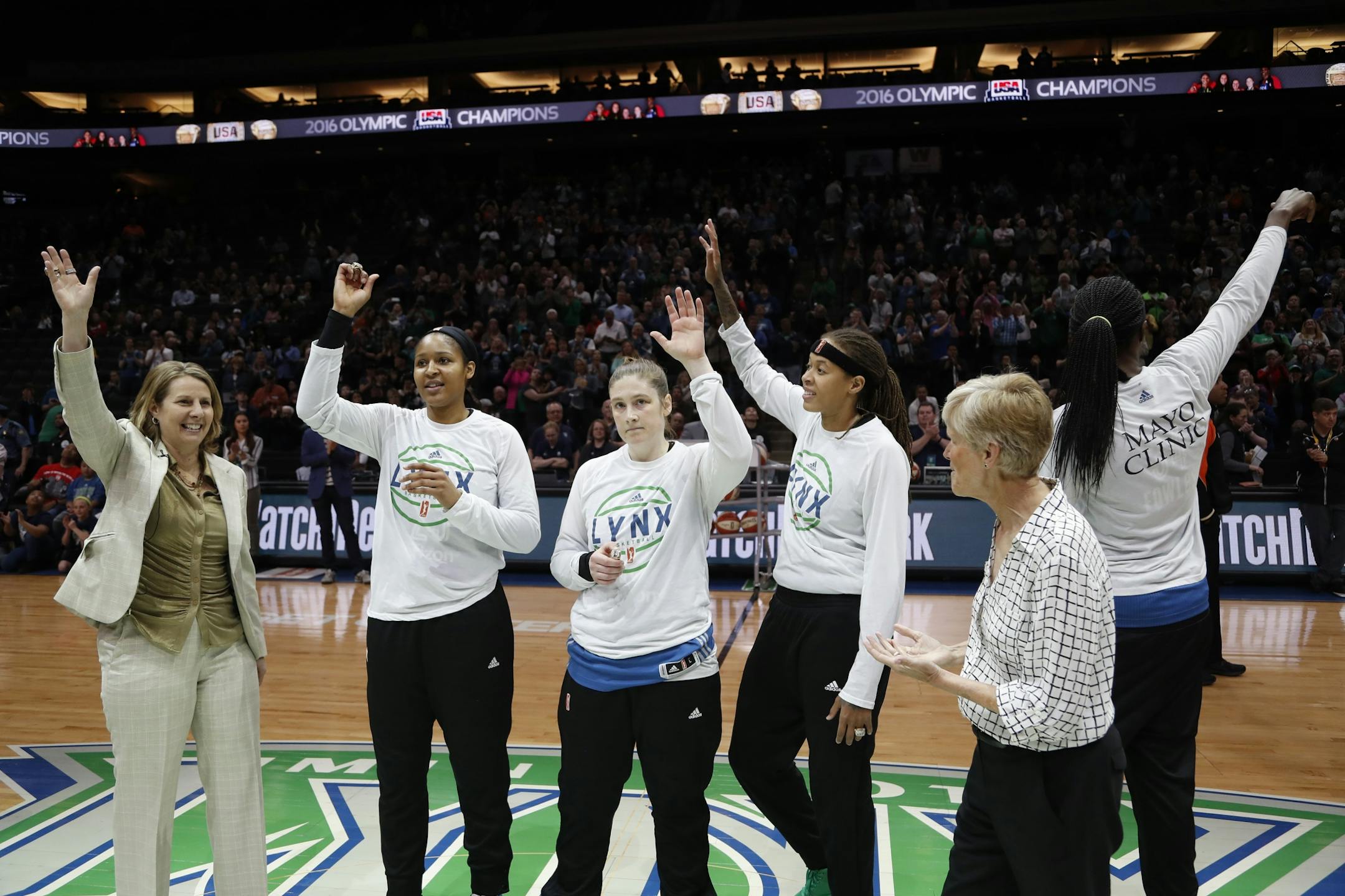 Lynx head coach Cheryl Reeve left with players Maya Moore , Lindsay Whalen, Seimone Augustus, and Sylvia Fowles celebrated with their Olympic rings at Xcel Energy Center May 22, 2017 in St. Paul, MN.
