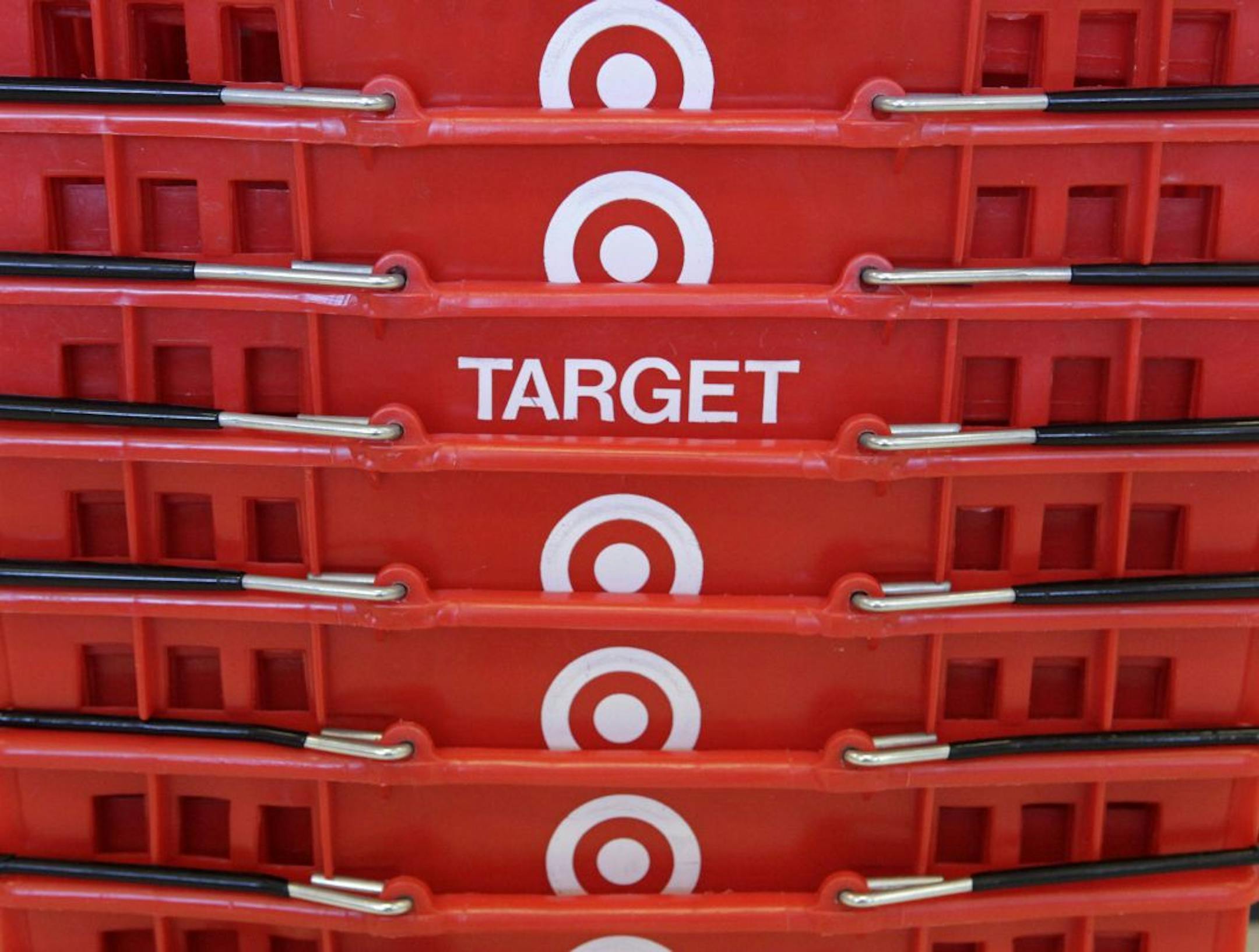 FILE - In this May 20, 2009 file photo, shopping baskets are stacked at a Chicago area Target store.