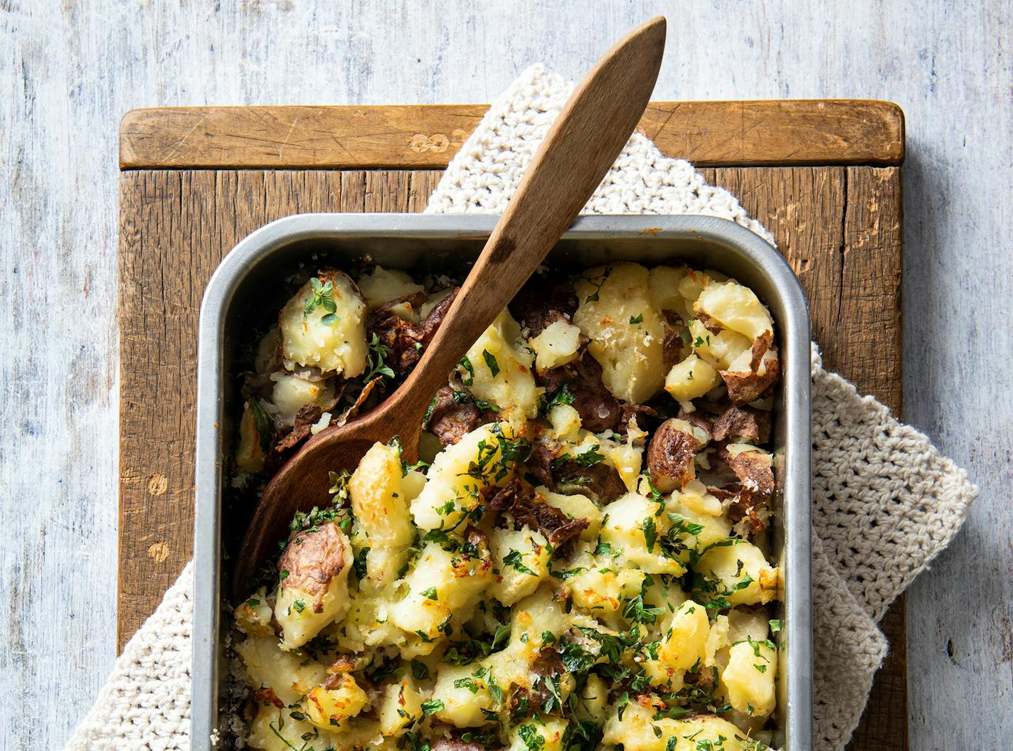 Smashed potatoes with olive oil. Recipe by Beth Dooley, photo by Mette Nielsen, special to the Star Tribune