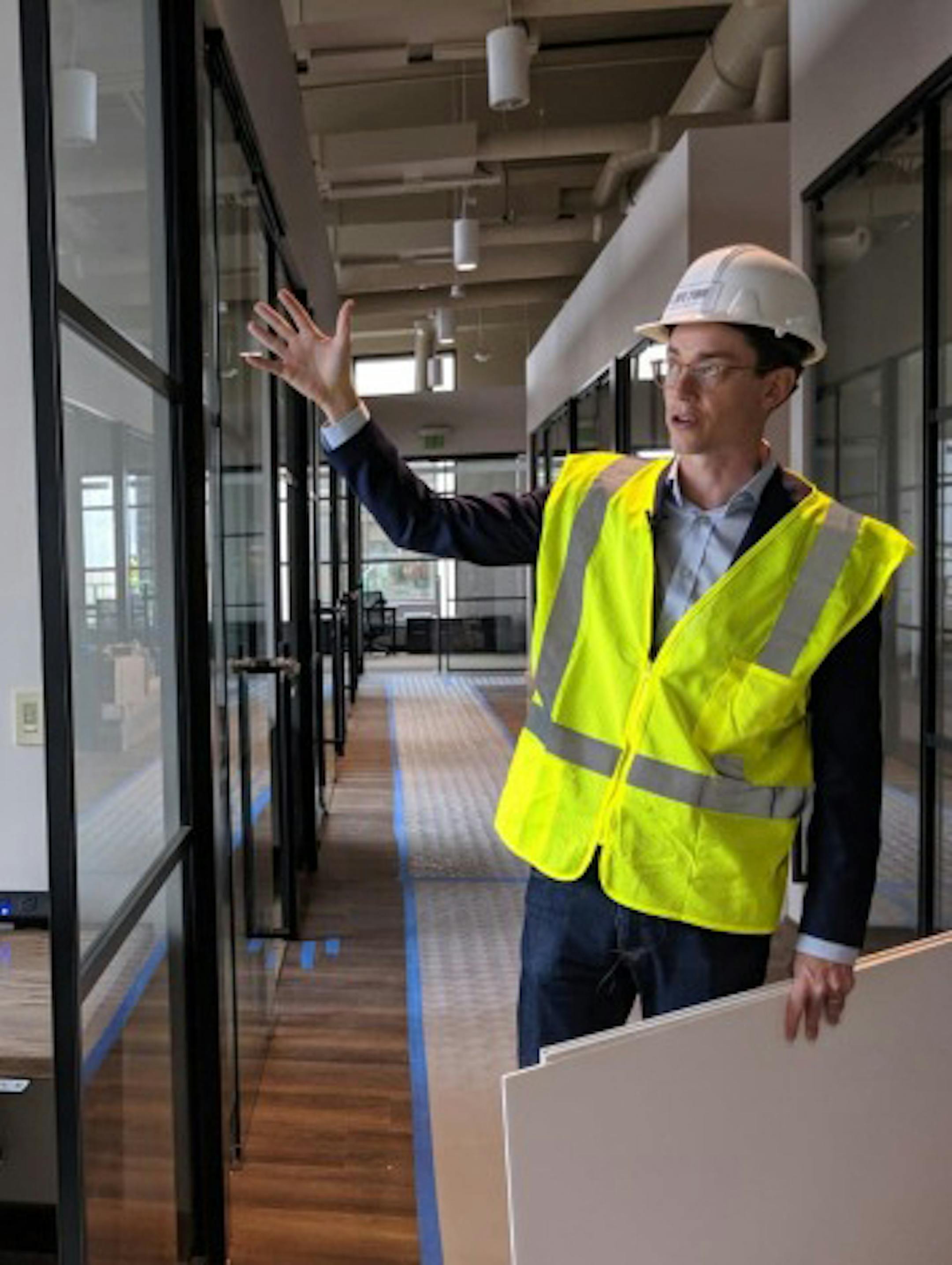 James O'Reilly, president of Life Time Work, gives a tour of a private office at Southdale location.Photo by Nicole Norfleet