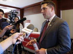 FILE - In this Jan. 30, 2018, file photo, Wisconsin Republican Senate candidate Kevin Nicholson speaks with reporters in Madison, Wis. Federal records