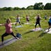 Krystal Turner led the class on the first night of Yoga in the Vineyard Wednesday evening, May 31, 2023 at Schram Vineyards in Waconia. Yoga in the Vi