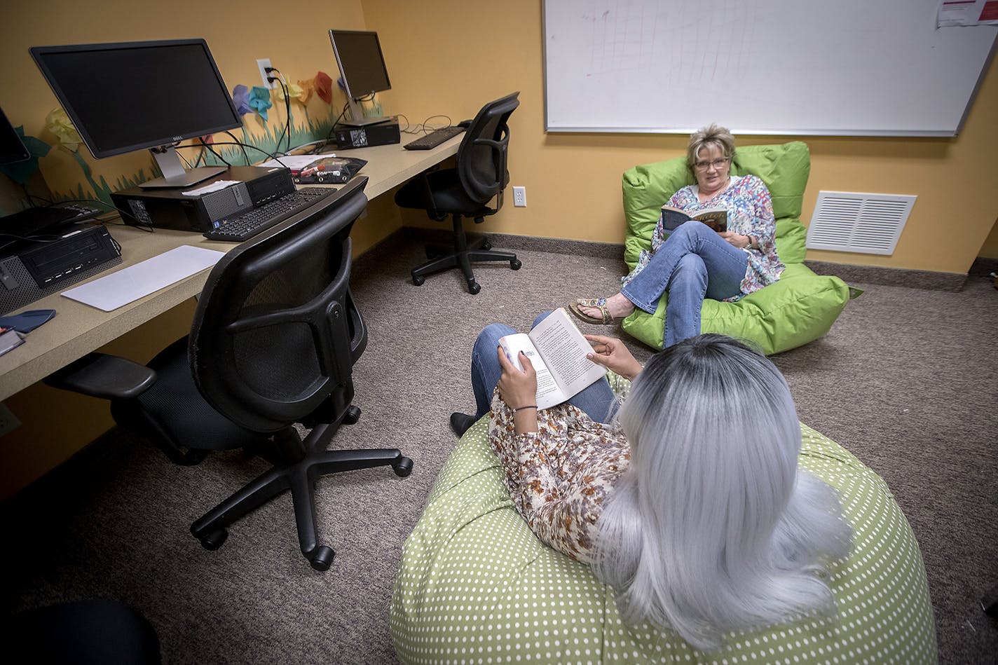 Caroline Carritt, a teacher with Prior Lake-Savage Area Schools who works full time at The Link read with a sex trafficking victim during a class, Friday, May 26, 2017 in Prior Lake, MN. ] ELIZABETH FLORES &#xef; liz.flores@startribune.com