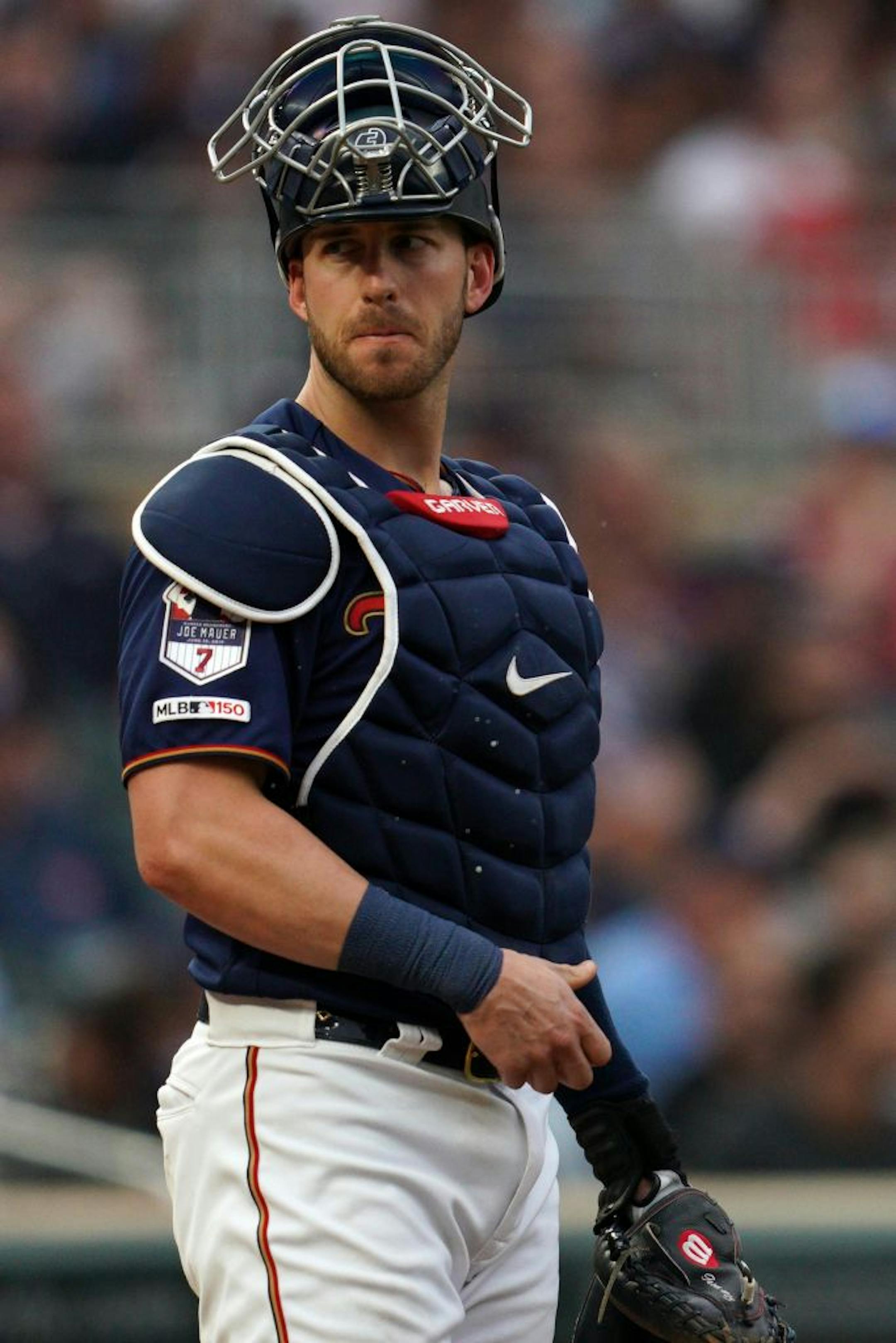 Minnesota Twins catcher Mitch Garver (18) watched from behind home plate in the fifth inning.