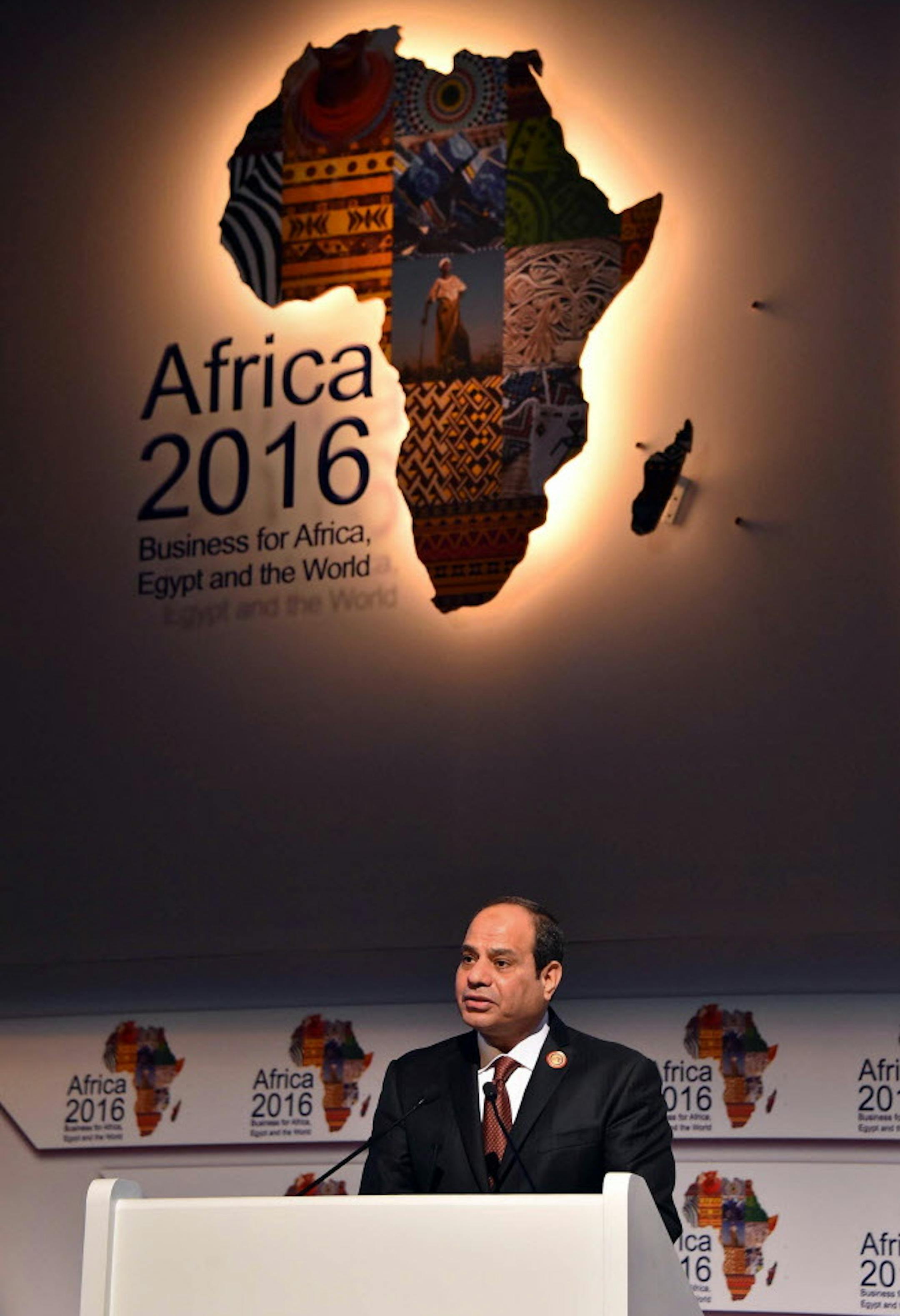 In this photo provided by Egypt's state news agency MENA, Egyptian President Abdel-Fattah el-Sissi, addresses an Africa-focused investment conference with government and private sector representatives, in Sharm el-Sheikh, Egypt, Saturday, Feb. 20, 2016. The conference is part of Cairoís efforts to strengthen ties with sub-Saharan African countries amid tensions over sharing the Nile. Egyptís private sector investment in Africa exceeds $8 billion, and Cairo hopes to double its trade wit
