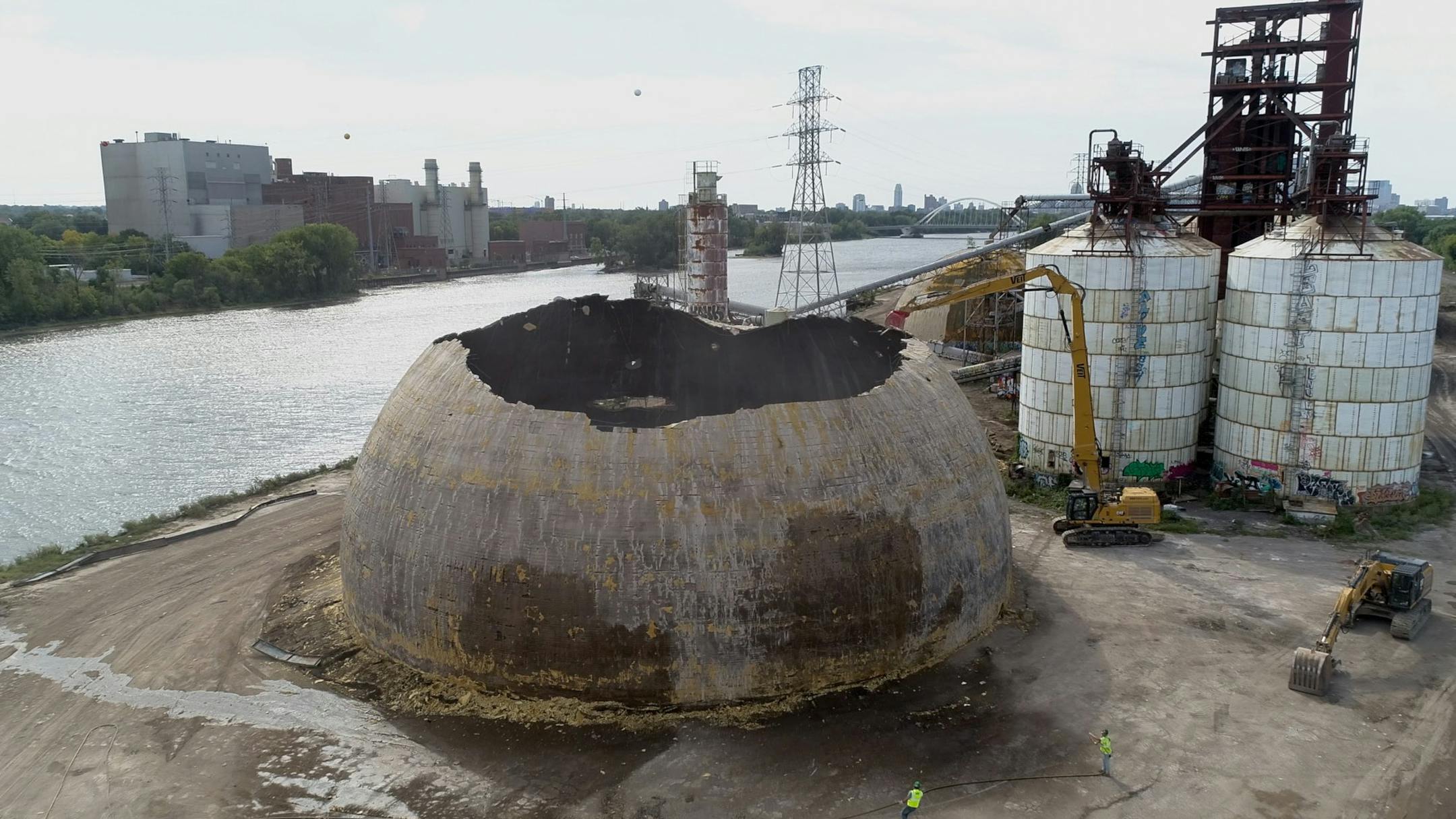 Crews began demolishing the concrete domes at the Upper Harbor Terminal on Friday, Sept. 2, 2022 in Minneapolis. The 48-acre site on the city's North Side will be home to a 10,000-seat First Avenue concert venue, housing and park land. ] MARK VANCLEAVE • mark.vancleave@startribune.com ORG XMIT: Demo3