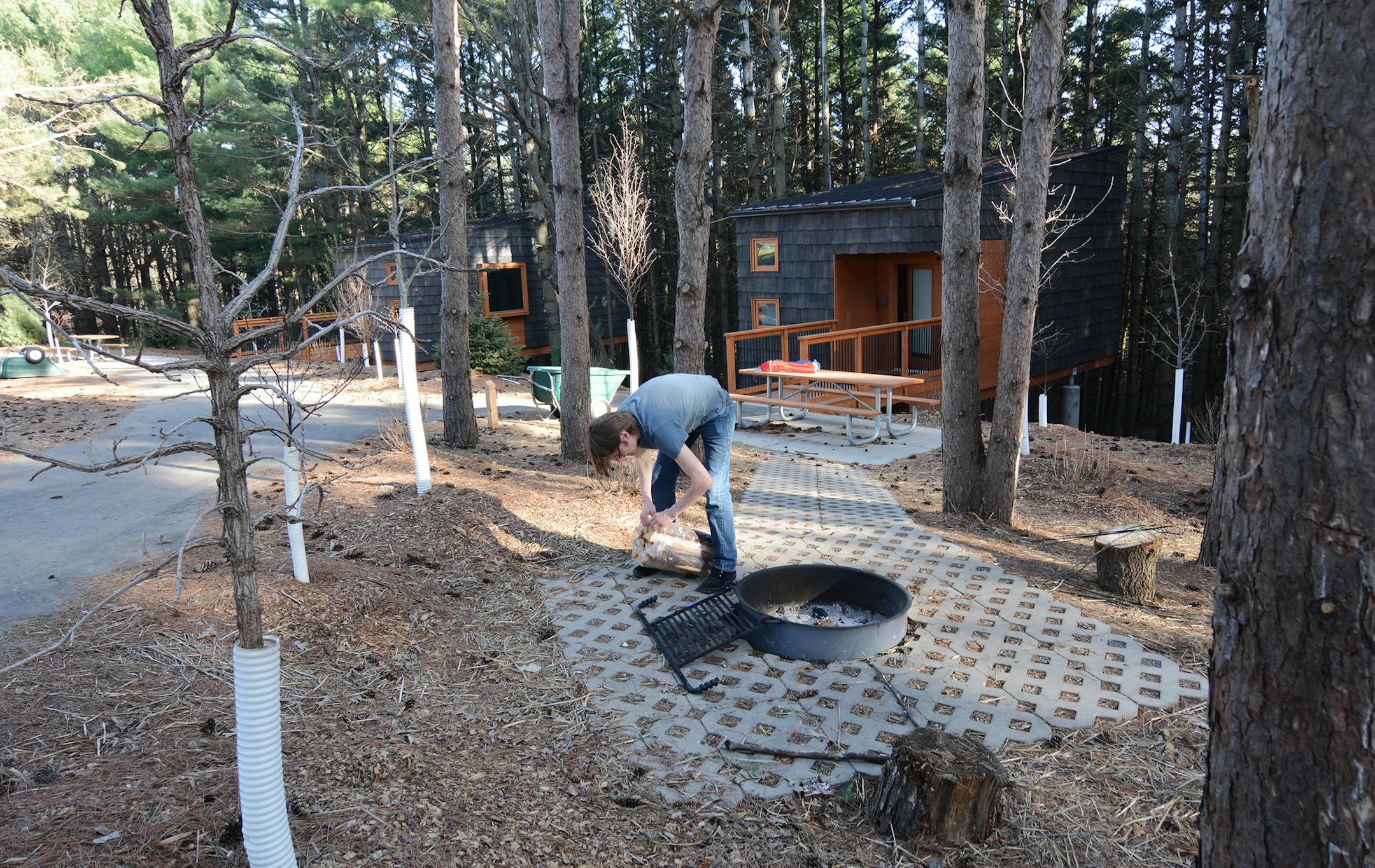Whitetail Woods: Tom Lemmer, of Minneapolis, made a campfire. The park&#x2019;s new camper cabins are open year-round.