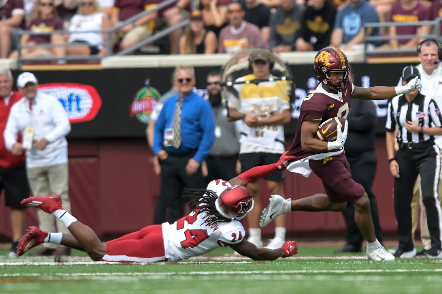 Gophers wide receiver Daniel Jackson ran for a first down in the first quarter as he was tackled by Miami (OH) defensive back Ja'don Rucker-Furlow